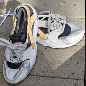 Nike Women's Sneakers in Black, White, and Gold